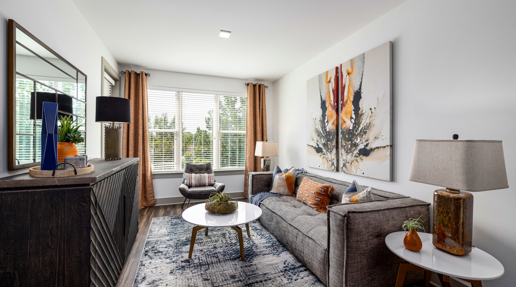 living room with picture widow and plank flooring living room with picture widow and plank flooring