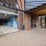 View of front entry from garage that has a floral mural 